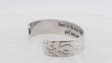 Load and play video in Gallery viewer, Shoot for the moon.  Even if you miss, you&#39;ll land among the stars. Inspirational Cuff
